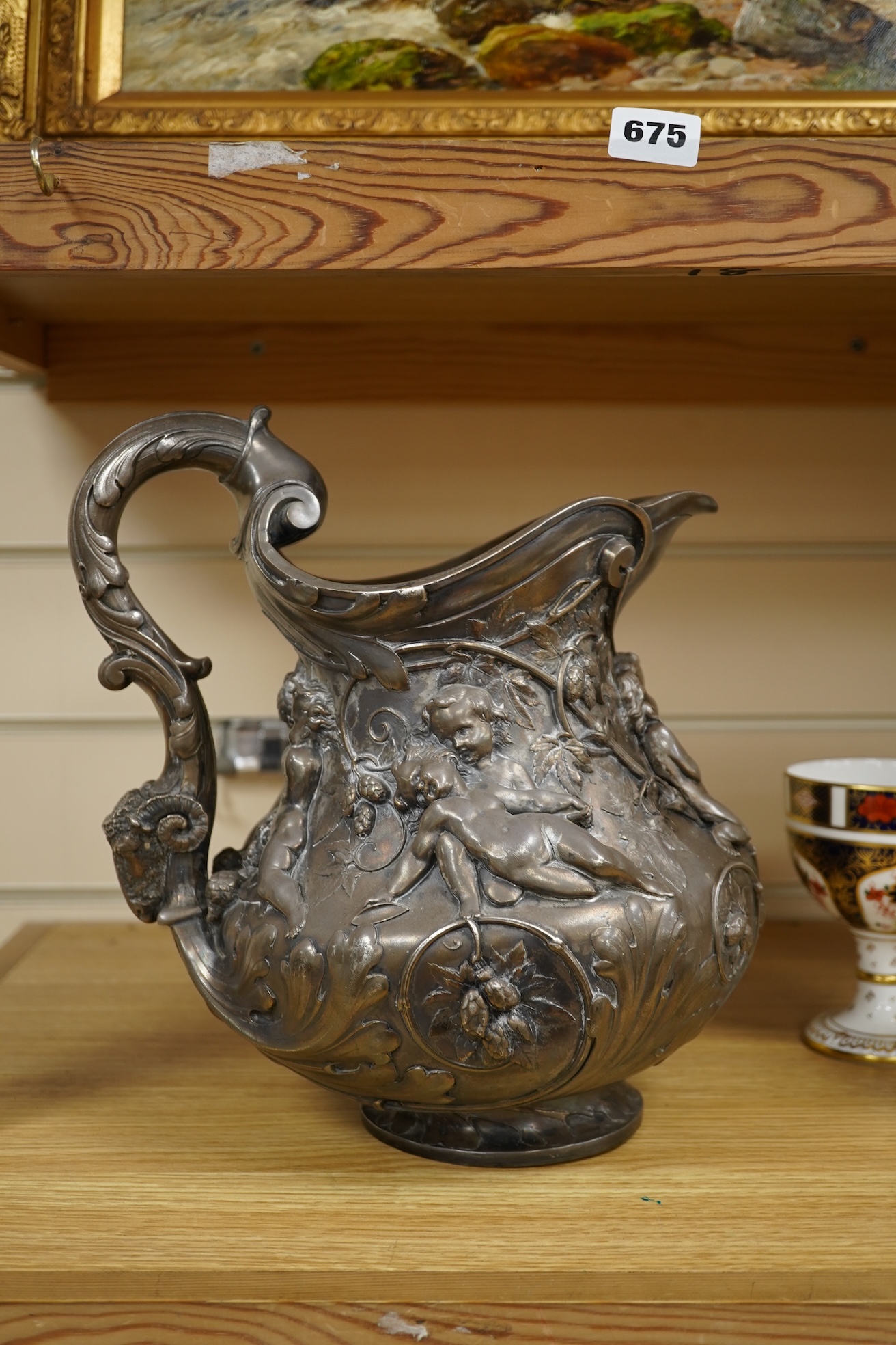 A large Victorian electrotype silver plated jug, in the manner of Elkington & Co., 28cm